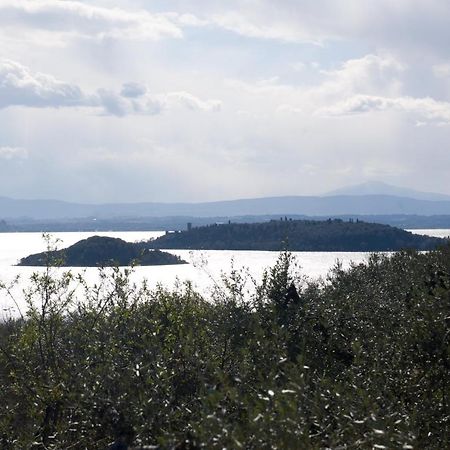 Aparthotel Antico Casale Tiravento à Passignano sul Trasimeno Extérieur photo