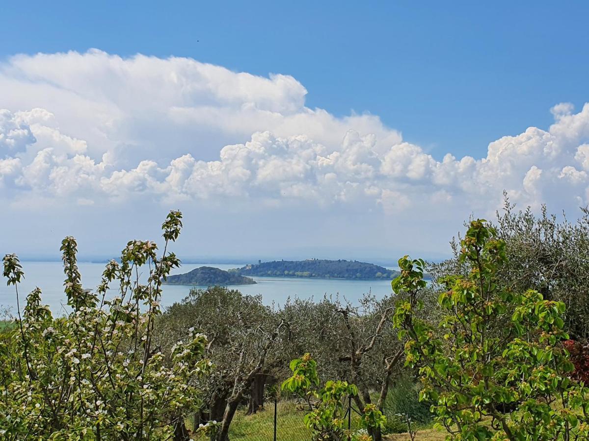 Aparthotel Antico Casale Tiravento à Passignano sul Trasimeno Extérieur photo