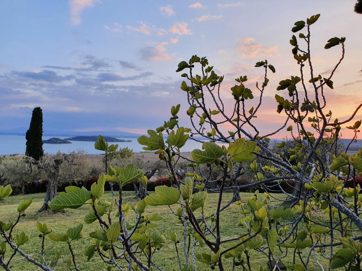 Aparthotel Antico Casale Tiravento à Passignano sul Trasimeno Extérieur photo