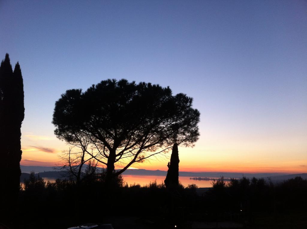 Aparthotel Antico Casale Tiravento à Passignano sul Trasimeno Extérieur photo