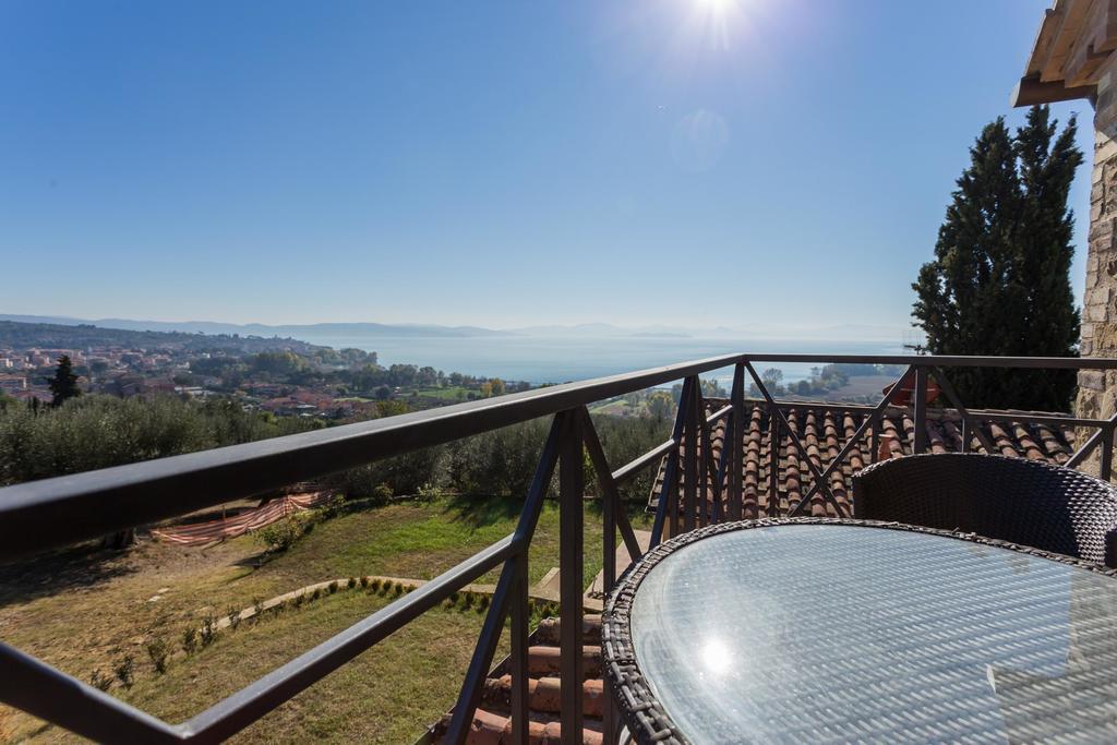 Aparthotel Antico Casale Tiravento à Passignano sul Trasimeno Chambre photo