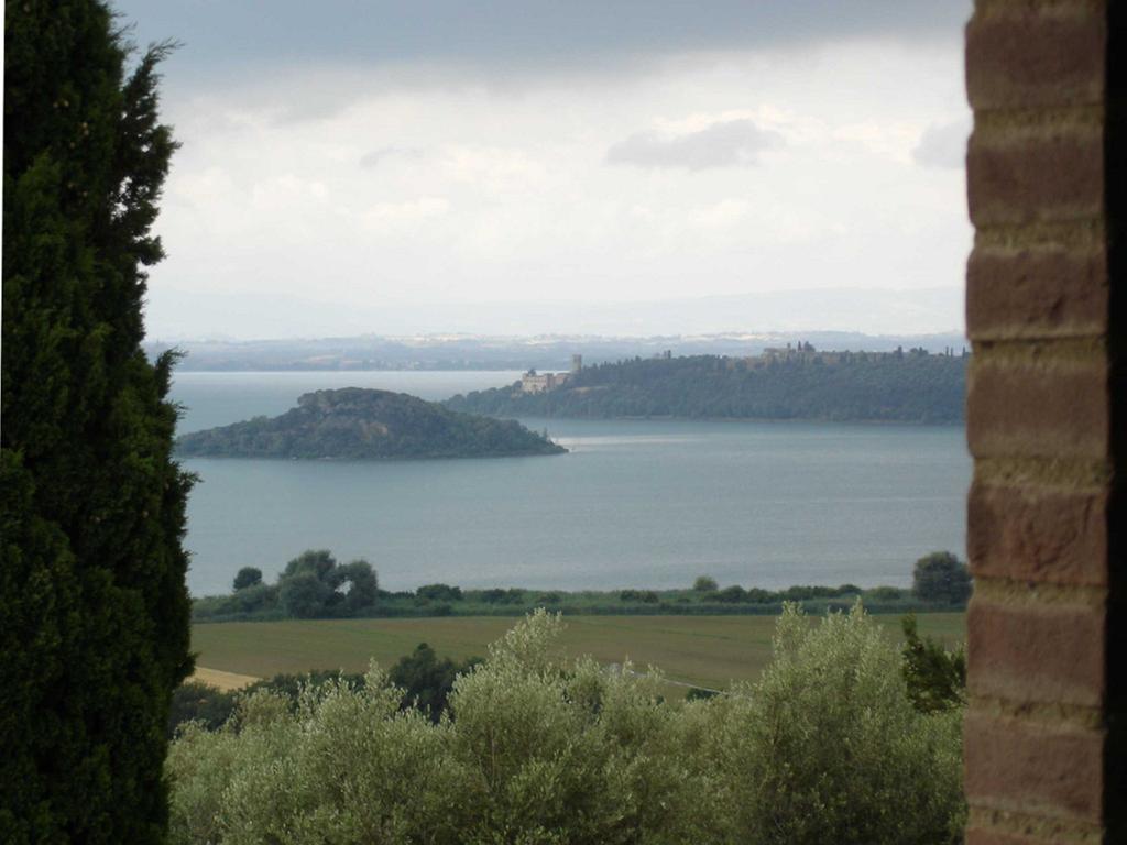 Aparthotel Antico Casale Tiravento à Passignano sul Trasimeno Chambre photo